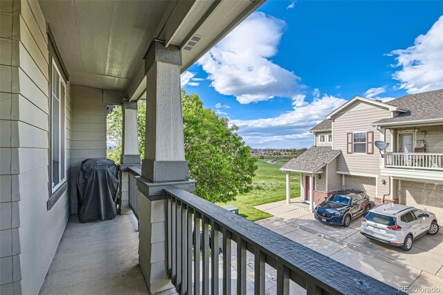 13151 Grant Cir N Unit C, Thornton, CO 80241 - balcony featuring a grill