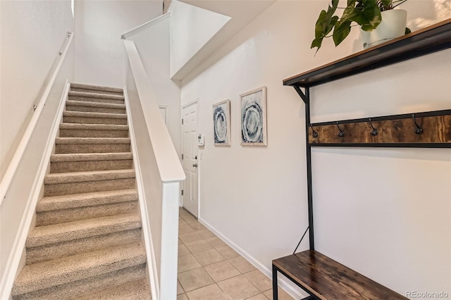 13151 Grant Cir N Unit C, Thornton, CO 80241 - stairs with tile patterned flooring and baseboards
