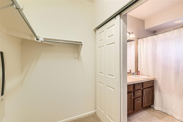 13151 Grant Cir N Unit C, Thornton, CO 80241 - bathroom with vanity and curtained shower