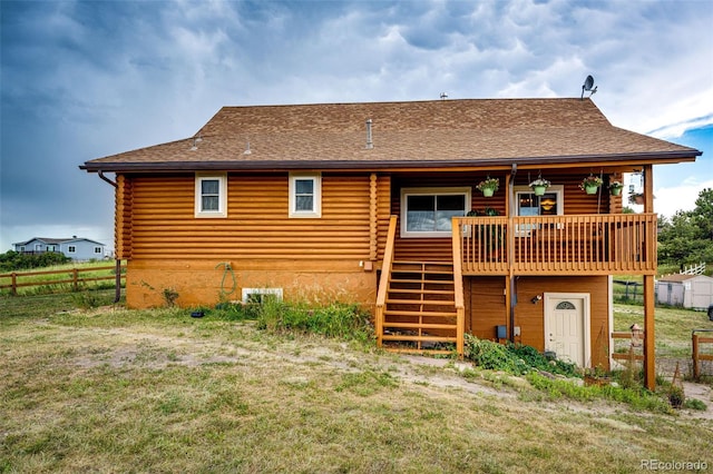 7573 Pine Crest Dr, Kiowa, CO 80117 - back of house featuring log siding, roof with shingles, and stairway