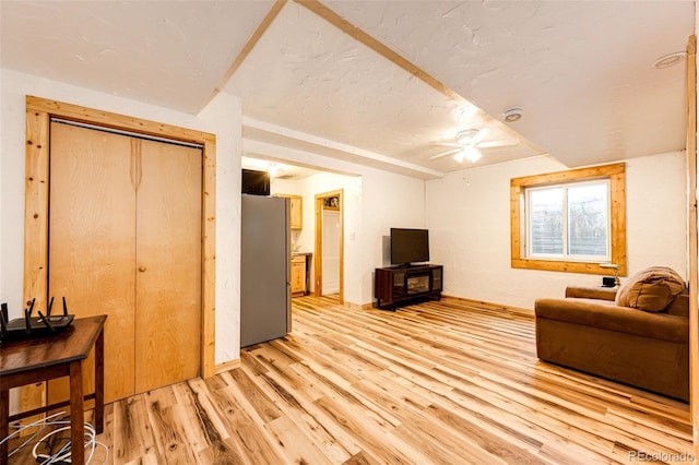 7573 Pine Crest Dr, Kiowa, CO 80117 - living area featuring light wood-style flooring and ceiling fan