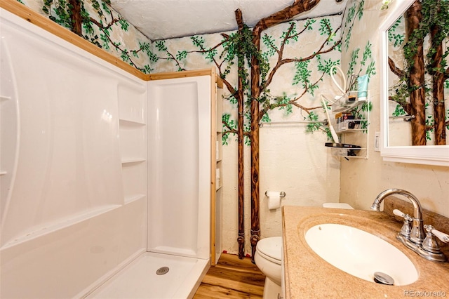 7573 Pine Crest Dr, Kiowa, CO 80117 - bathroom with vanity, walk in shower, and wood finished floors