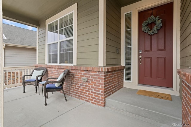 entrance to property with a porch