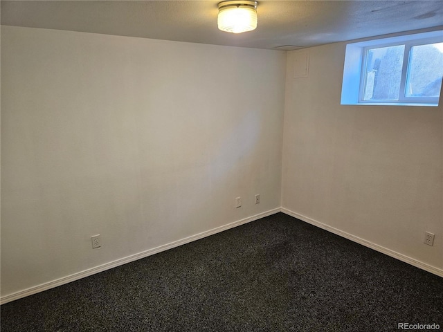 spare room featuring carpet floors