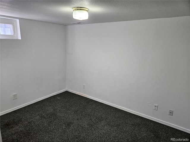 unfurnished room featuring carpet flooring