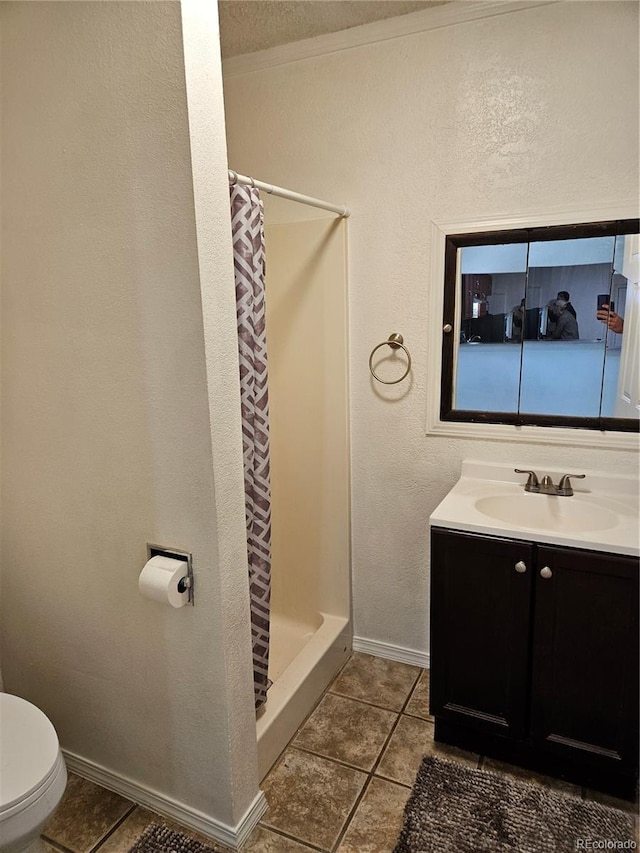 bathroom with tile patterned floors, vanity, curtained shower, and toilet