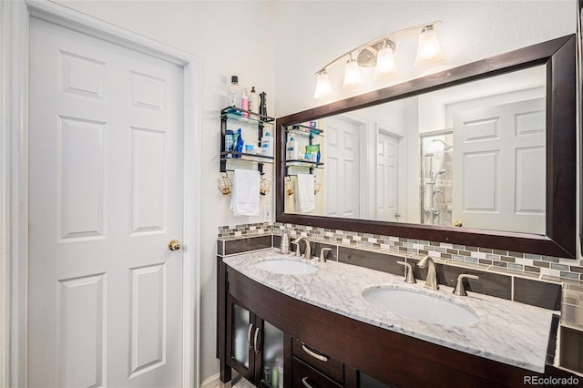 19628 E 58th Pl, Aurora, CO 80019 - full bathroom with decorative backsplash and double vanity