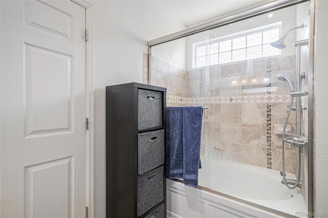 19628 E 58th Pl, Aurora, CO 80019 - full bath with combined bath / shower with glass door