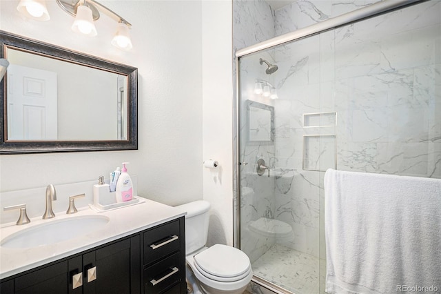 19628 E 58th Pl, Aurora, CO 80019 - full bath featuring toilet, a marble finish shower, and vanity