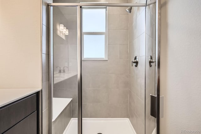 full bathroom featuring a shower stall