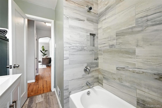 2955 Poplar St, Denver, CO 80207 - bathroom with shower / tub combination, vanity, and wood finished floors