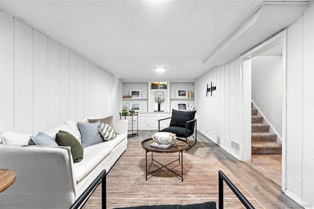 2955 Poplar St, Denver, CO 80207 - living area featuring light wood-style floors and stairway
