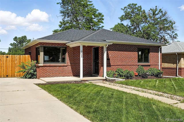 2955 Poplar St, Denver, CO 80207 - bungalow-style house with a shingled roof and brick siding