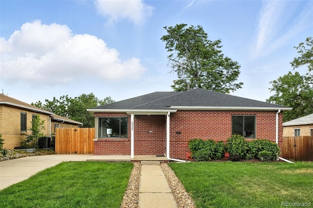 2955 Poplar St, Denver, CO 80207 - view of front of property with brick siding and roof with shingles