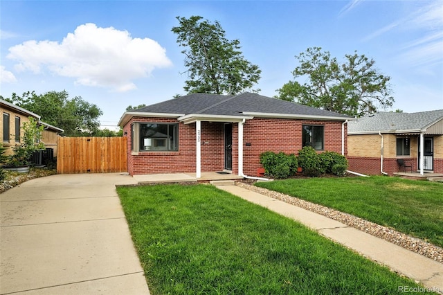2955 Poplar St, Denver, CO 80207 - view of front of property with brick siding and roof with shingles