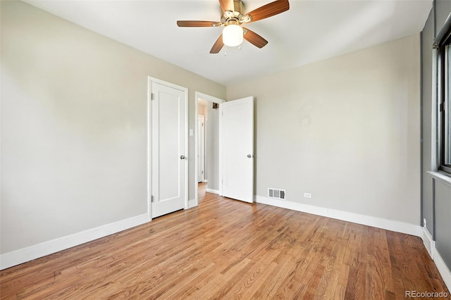 2955 Poplar St, Denver, CO 80207 - spare room featuring light wood-style floors and a ceiling fan