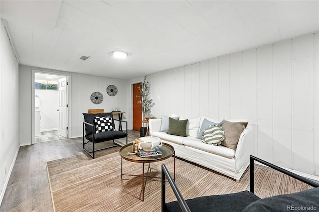 2955 Poplar St, Denver, CO 80207 - living room featuring wood finished floors and baseboards