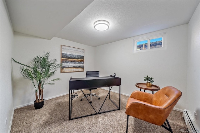 carpeted home office with a textured ceiling and baseboard heating