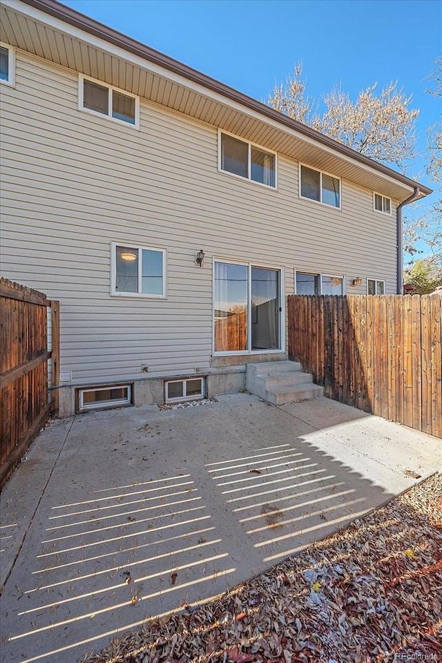 rear view of house with a patio