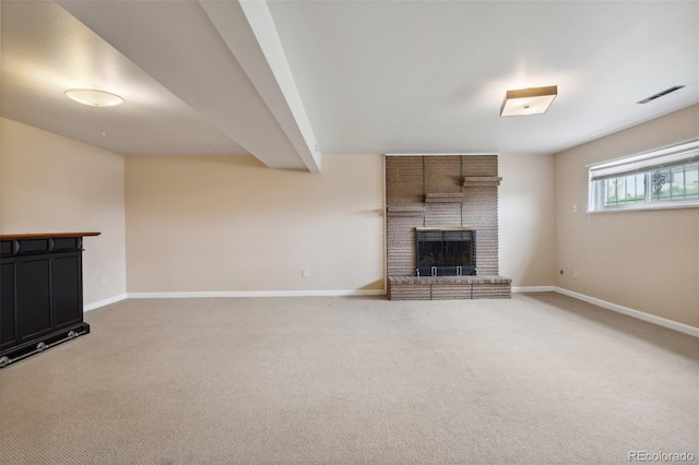 1422 N Chelton Rd, Colorado Springs, CO 80909 - unfurnished living room featuring light carpet, baseboards, and a brick fireplace