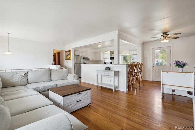 1422 N Chelton Rd, Colorado Springs, CO 80909 - living area featuring wood finished floors and a ceiling fan