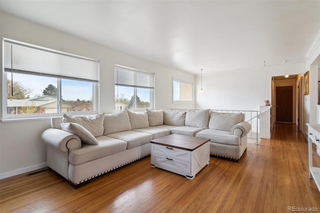 1422 N Chelton Rd, Colorado Springs, CO 80909 - living room featuring light wood-style floors