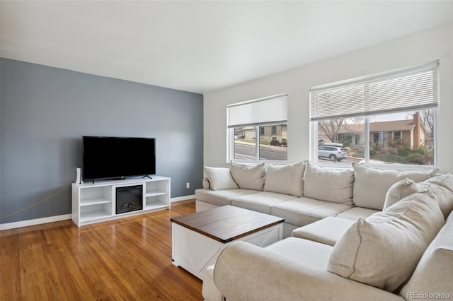 1422 N Chelton Rd, Colorado Springs, CO 80909 - living area with wood finished floors and baseboards