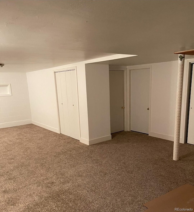 415 N Division Ave, Sterling, CO 80751 - basement with carpet floors and concrete block wall