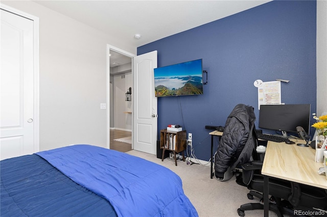 bedroom featuring baseboards and carpet flooring