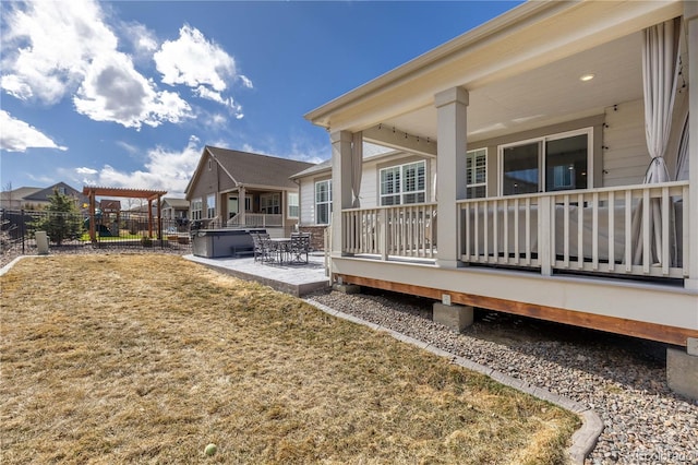 rear view of property featuring fence private yard, a patio area, and a residential view