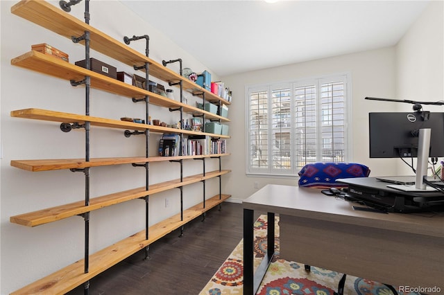 office area with dark wood-style floors and baseboards