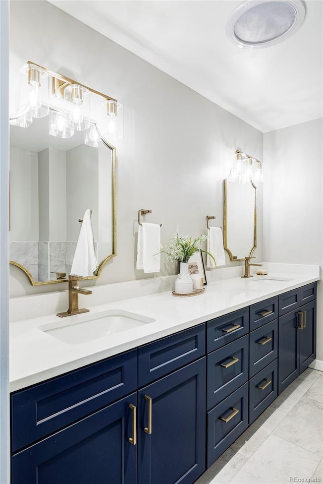 bathroom featuring tile patterned floors and vanity