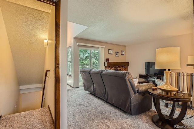 2090 S Hannibal Way Unit F, Aurora, CO 80013 - living area featuring a textured ceiling and carpet