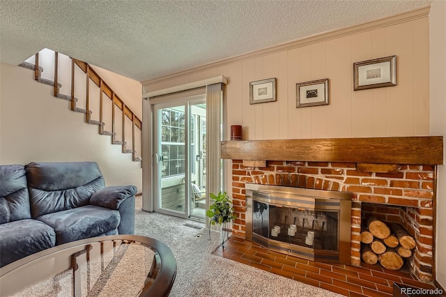 2090 S Hannibal Way Unit F, Aurora, CO 80013 - living room with carpet, a textured ceiling, a fireplace, and stairway