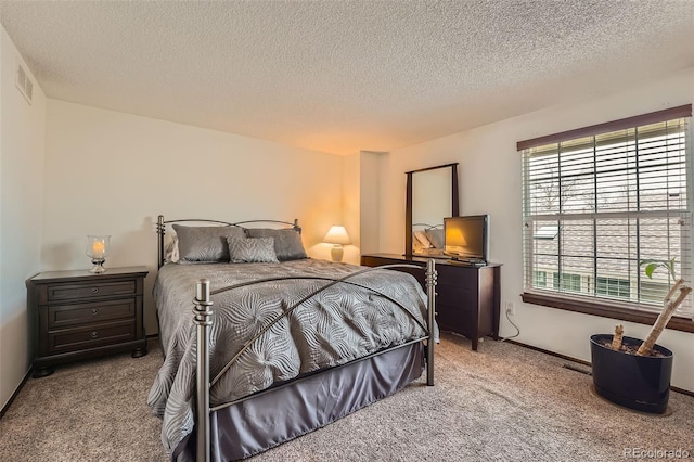 2090 S Hannibal Way Unit F, Aurora, CO 80013 - carpeted bedroom with visible vents and a textured ceiling