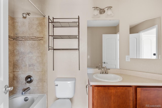 full bath with shower / bathing tub combination, vanity, and toilet