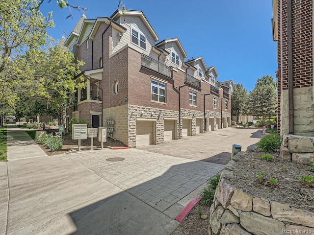 30 Garfield St Unit B, Denver, CO 80206 - view of concrete road featuring a residential view