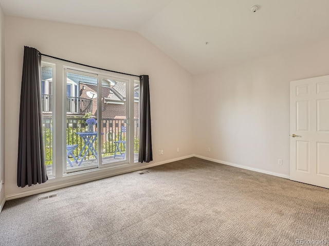 30 Garfield St Unit B, Denver, CO 80206 - carpeted spare room with lofted ceiling, baseboards, and a smoke detector