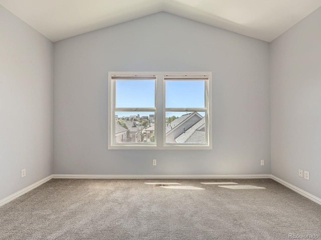 30 Garfield St Unit B, Denver, CO 80206 - carpeted spare room with vaulted ceiling and baseboards