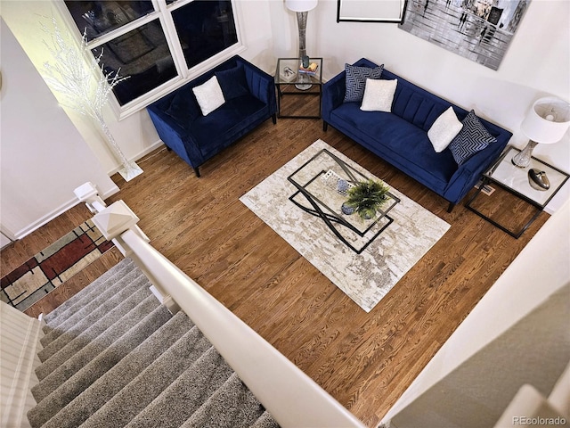 living room featuring dark wood-type flooring