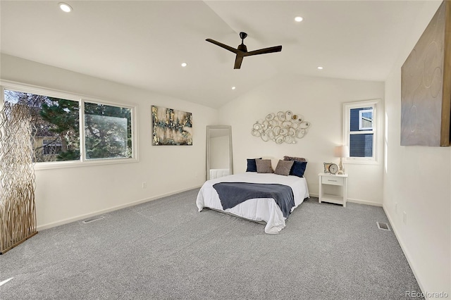 bedroom featuring carpet, vaulted ceiling, and ceiling fan