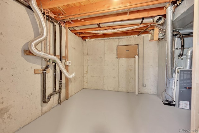 basement featuring heating unit