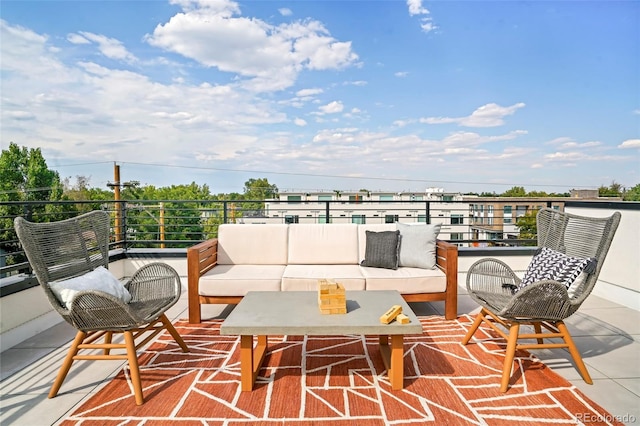 view of patio featuring an outdoor hangout area and a balcony