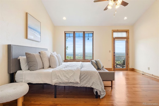948 Manor Gate Pt, Colorado Springs, CO 80906 - bedroom featuring lofted ceiling, light wood-type flooring, access to exterior, baseboards, and a ceiling fan