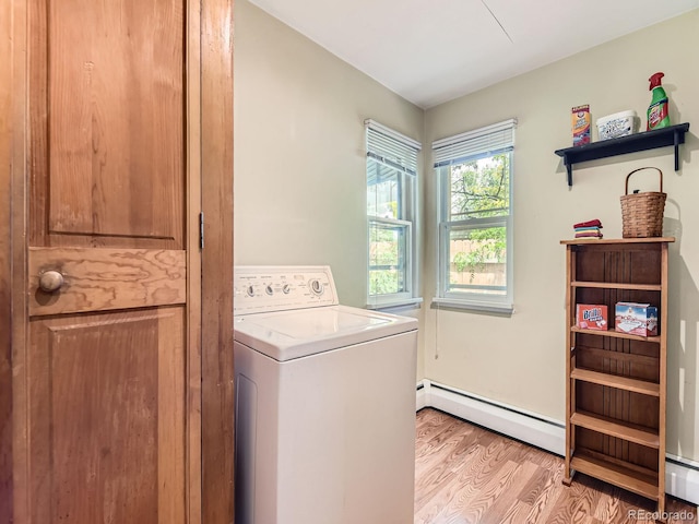 3265 S Ogden St, Englewood, CO 80113 - laundry area featuring washer / clothes dryer, baseboard heating, and light wood finished floors