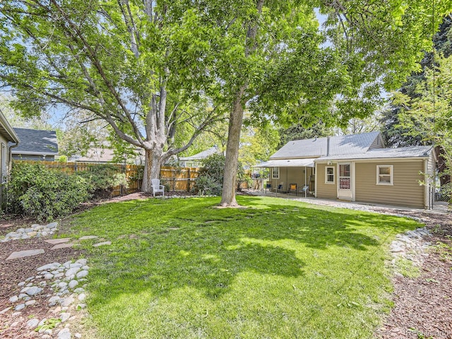 3265 S Ogden St, Englewood, CO 80113 - view of yard featuring a patio area