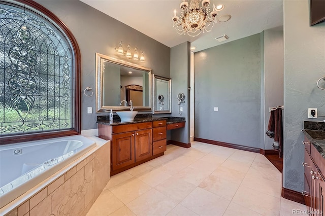 4725 Palmer Ridge Dr, Parker, CO 80134 - bathroom featuring vanity, a garden tub, a chandelier, and tile patterned flooring