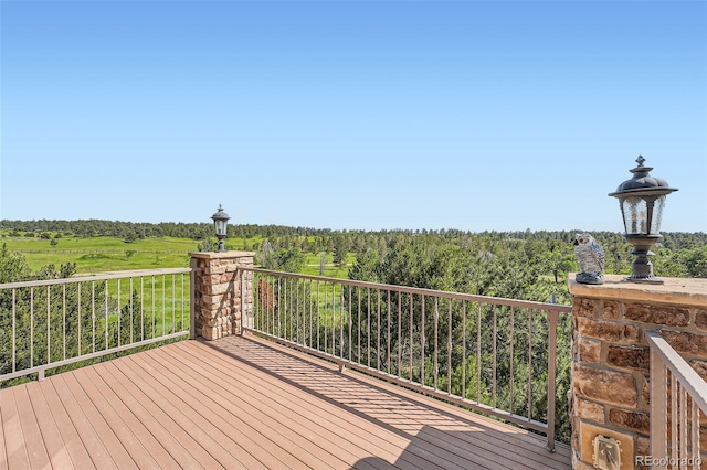 4725 Palmer Ridge Dr, Parker, CO 80134 - wooden deck featuring a wooded view