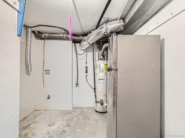 235 S Stuart St, Denver, CO 80219 - unfinished basement featuring water heater and freestanding refrigerator
