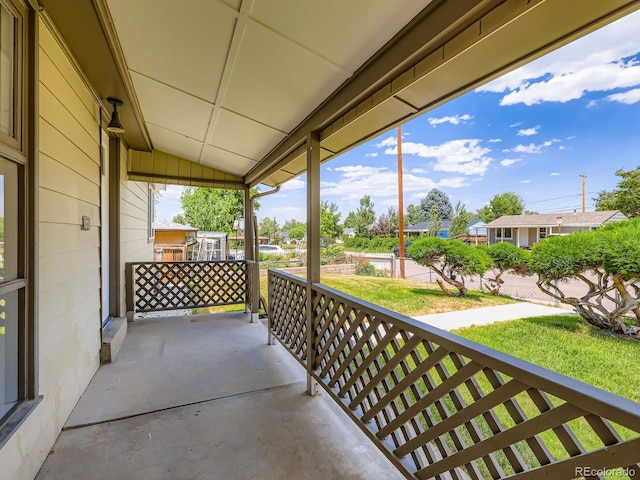 235 S Stuart St, Denver, CO 80219 - porch featuring a yard